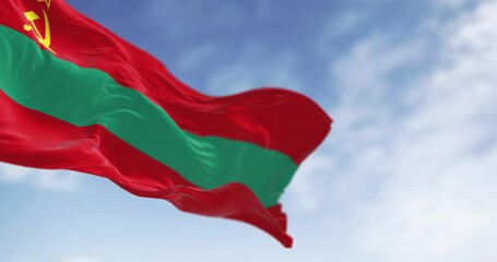 Close-up of the national flag of Transnistria waving in the wind