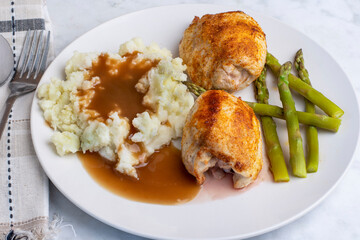 seasoned chicken thighs with mashed potatoes