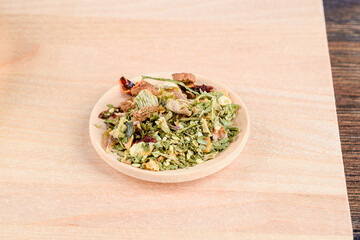 Serving bowl with dried herbs, spices and seasonings for instant noodles.
