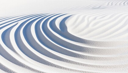 Obraz premium A serene, abstract view of undulating sand patterns with soft shadows, creating a tranquil and minimalist aesthetic.