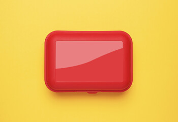 Plastic box on a yellow