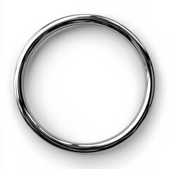 Minimalistic silver ring on white surface reflecting light and shadow