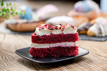 Red velvet cake with cream on top