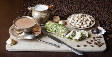 Sweets on the background of coffee on the table