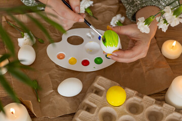 Springtime egg painting activity celebrates Easter with vibrant colors and creativity
