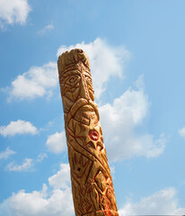Old wooden idol in the field