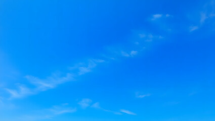 blue sky with clouds. Light sky blue shades watercolor background.Grunge blue background with space for text,watercolor abstract painting of blue grunge texture.