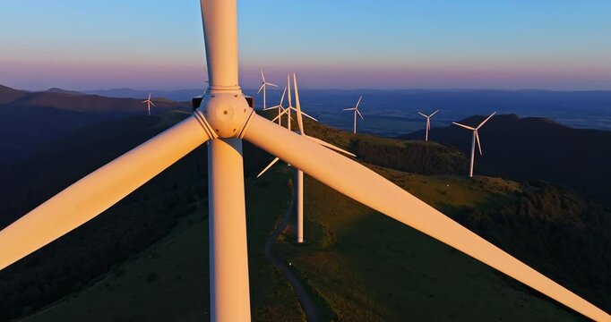 Vibrant Sunrise Wind Generator Park On Mountain Top Central Bulgaria