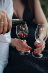 wine is poured into glasses