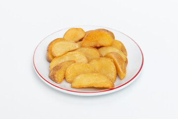 Fried potatoes on a plate isolated on a white background.