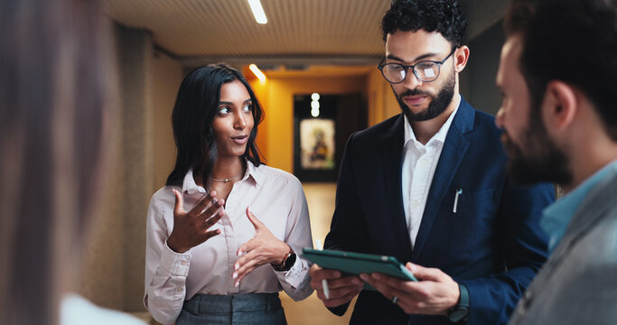 Seminar, lobby and business people with tablet for feedback, schedule discussion or conference hall planning. Office, employee and keynote speaker with smile for networking, research or online review