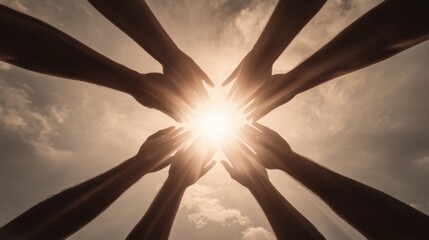 Diverse hands forming a circle around bright sunlight, symbolizing unity and teamwork.