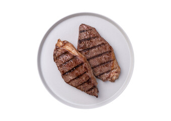 Grilled picanha beefs in a plate isolated over white background