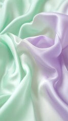Obraz premium Soft silk fabric in green and purple hues.