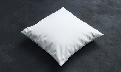 Naklejka premium A white pillow sits on a black surface