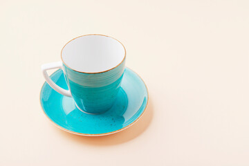 A blue cup on the table.