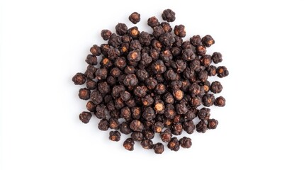 A heap of ripe black mulberries displayed against a white background from a top-down perspective