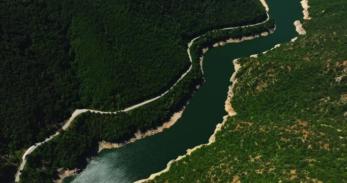 Route Through Cinematic Vibrant Valley River Passageway High Altitude Steady Scene