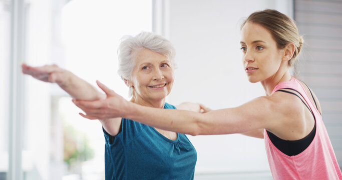 Yoga, fitness instructor and help senior woman stretching for geriatric wellness and rehabilitation. Healthy body, coach and pilates exercise for physiotherapy, balance and happy together in gym - Powered by Adobe