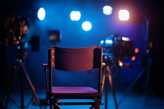 Director&rsquo;s chair on a cinematic film set with dramatic lighting