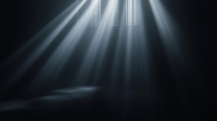 Black and white photograph of a dark room with a window in the center.