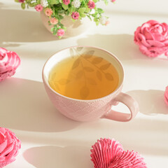 Rose and heart shape marshmallow with cup of tea. Valentine's Day celebration