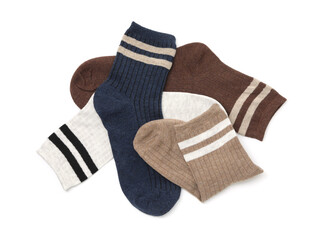 Different soft socks isolated on white, top view