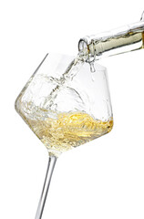 Pouring wine into glass isolated on white