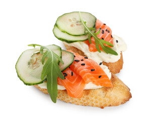 Delicious bruschette with cream cheese, salmon and cucumber isolated on white