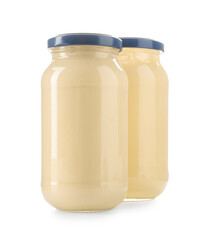 Tasty mayonnaise sauce in glass jars isolated on white