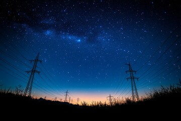 Obraz premium Night sky filled with stars over power lines at dusk in a remote area