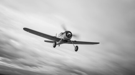 Vintage propeller plane in flight, monochrome.