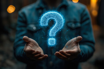 Businessman holding glowing question mark: future of technology and innovation