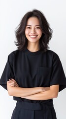 Asian female barber adjusts hair of client with precision and care, showcasing professional skills in a styled environment