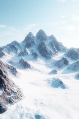 Obraz premium Majestic snow-capped mountains under a clear blue sky