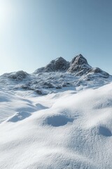 Obraz premium Snow-covered mountain landscape under a clear sky