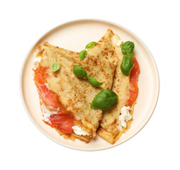 Delicious crepes with salmon, cream cheese and basil isolated on white, top view