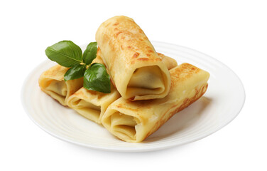 Delicious rolled crepes with basil isolated on white