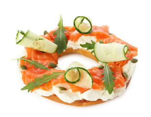 Half of delicious bagel with salmon, cream cheese and cucumber isolated on white