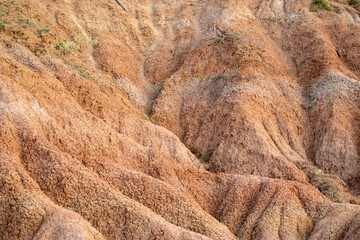 the Tatacoa Desert in Colombia, Huila, showcasing its arid landscape, eroded canyons, unique rock formations, and vibrant skies. Perfect for nature, travel, and adventure themes.