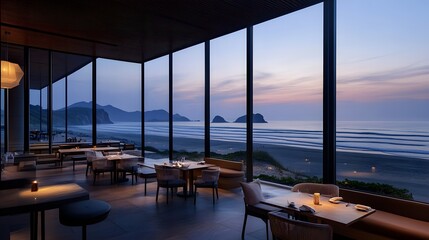 Fototapeta premium 夕暮れのビーチサイドレストランとロマンチックな海の風景