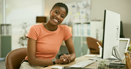 Black woman, computer and smile for office job, employee and portrait for copywriter career....
