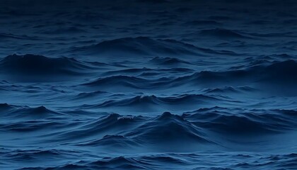 Fototapeta premium Deep Blue Ocean Waves Rolling Under Night Sky