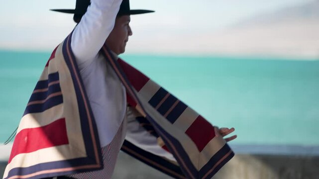 Traditional chilean cueca dance performed by a couple wearing typical costumes
