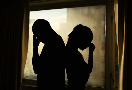 Man woman couple standing with back facing each other. Argument, disagreement, dispute, divorce concept.	 - Powered by Adobe