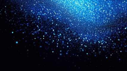 Bright blue particles shimmering against a dark background for an enchanting visual effect