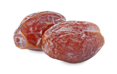 Two tasty dried dates isolated on white