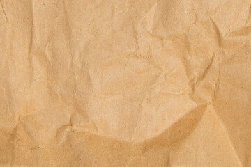 Crumpled and wrinkled brown paper surface tekture background.Natural abstract pattern and tekture.For graphic design or banner background