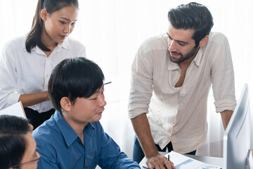 Fototapeta premium Group of diverse office worker employee working together on strategic business marketing planning in corporate office room. Positive teamwork in business workplace concept. Prudent