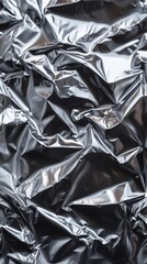 Abstract Wrinkled Silver Foil Texture: A Play of Light and Shadow